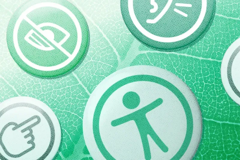 A collage of round buttons with accessibility symbols on a plant background.